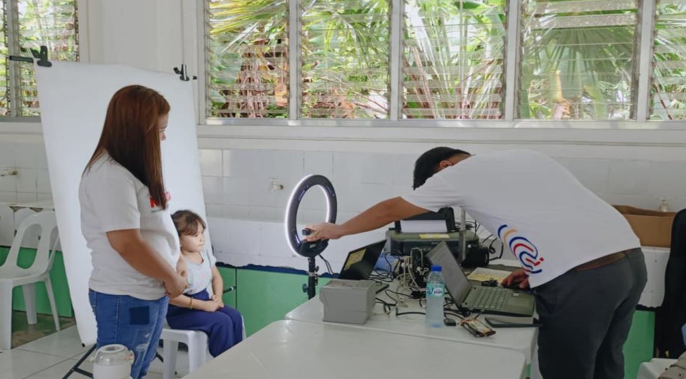 RKO Terenz Factor registers a child below 5 years old in one of the mobile registration activities in the barangays.